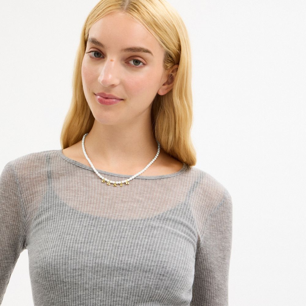 Coach Coach Charms Pearl Necklace Gold Pearl