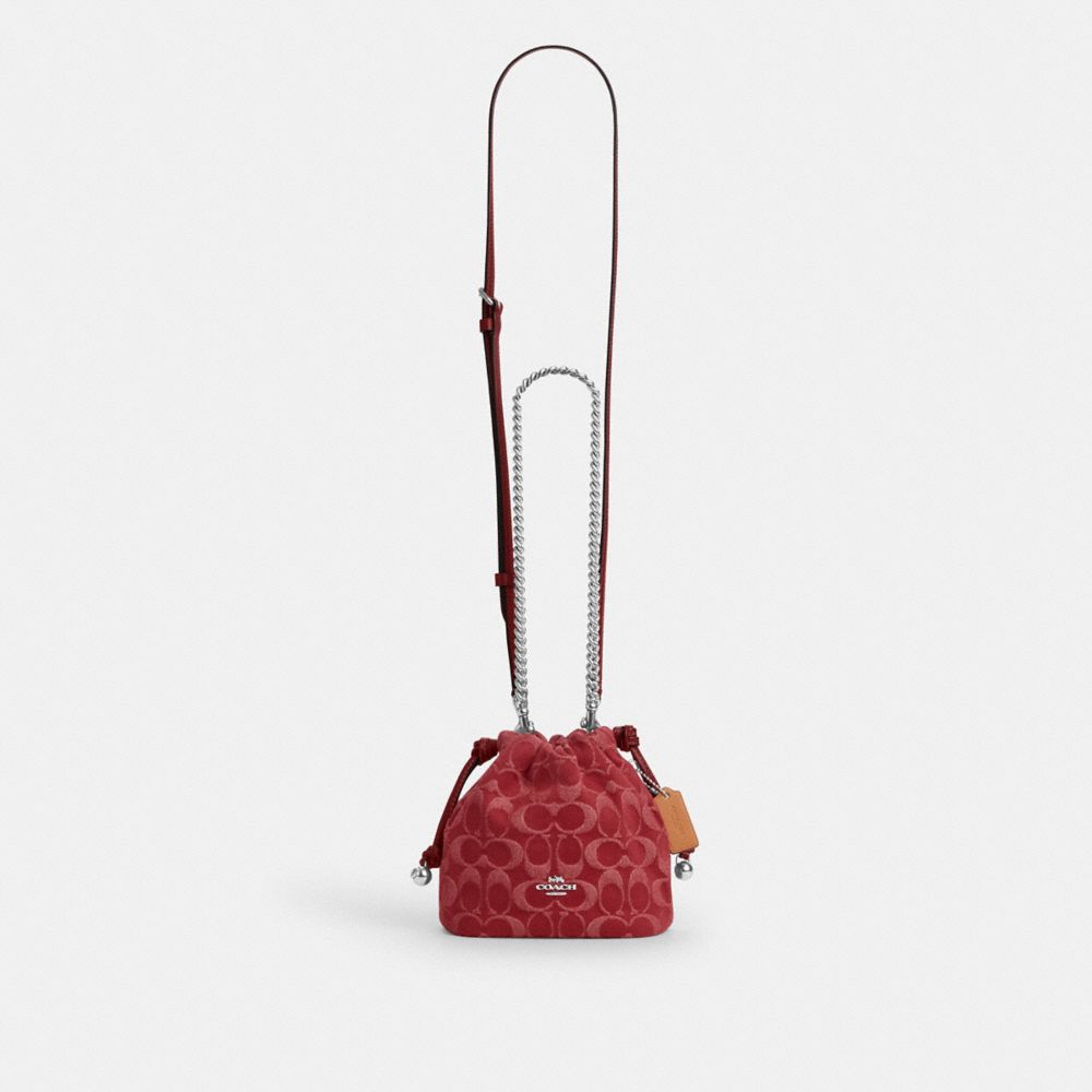 Coach Faye Mini Drawstring Bag In Signature Denim Silver True Red