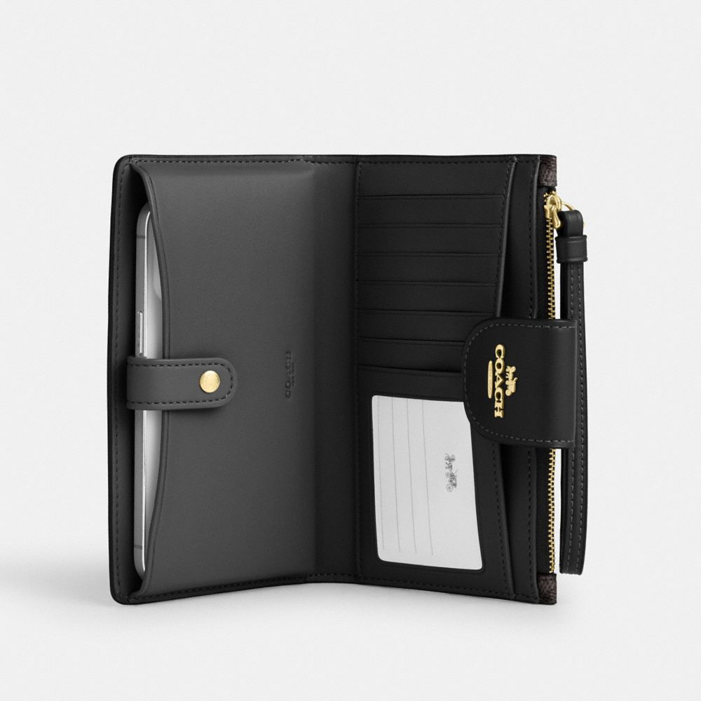 Coach Phone Wallet In Signature Canvas Gold Walnut Black