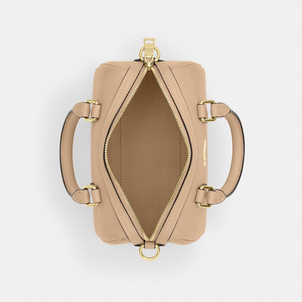 Coach Mini Rowan Crossbody Bag In Signature Leather Gold Oat