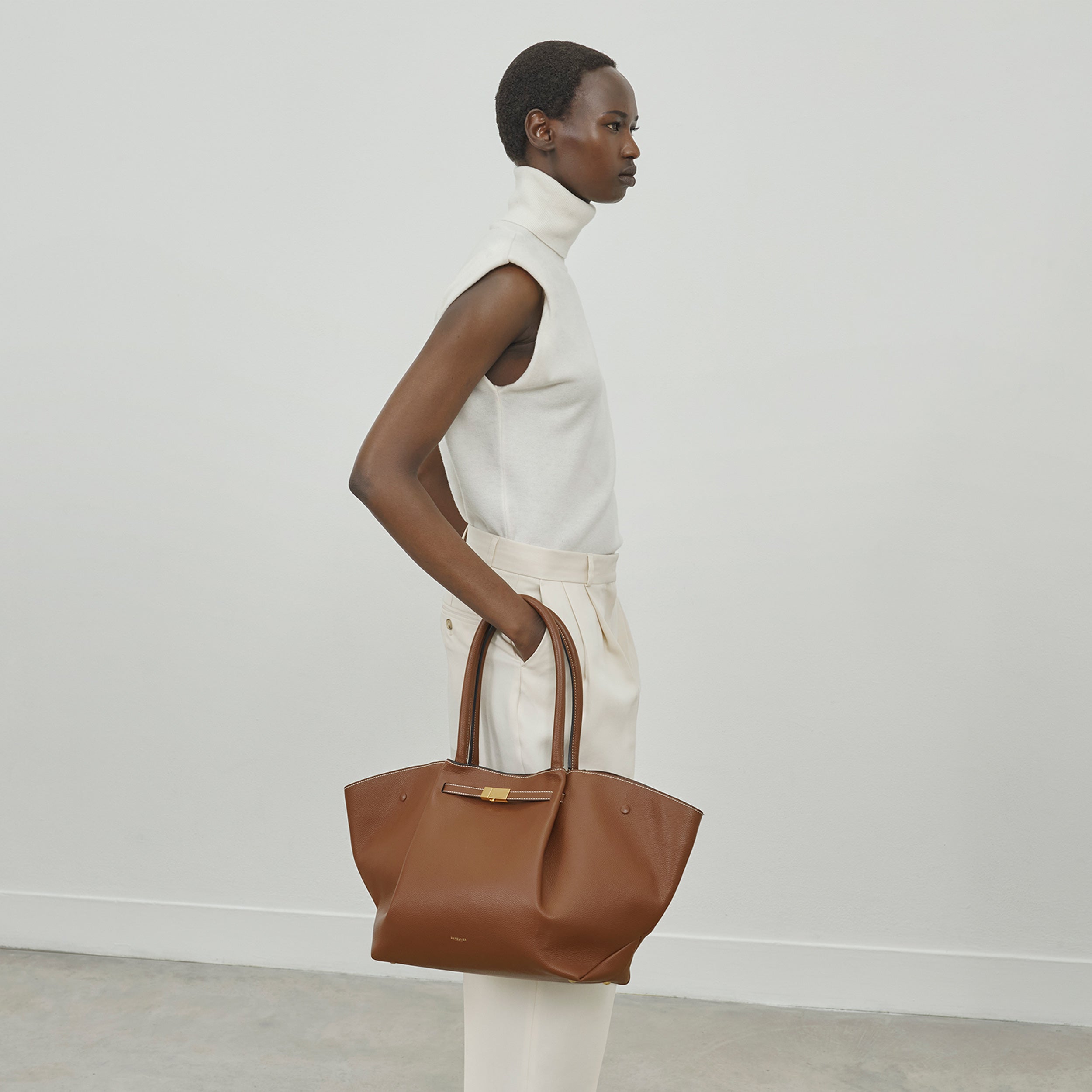 DeMellier The New York tan small grain ecru stitching